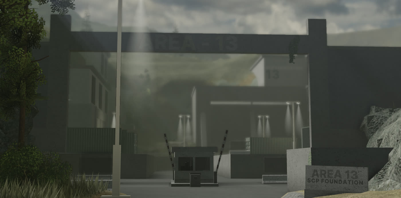 The Area 13 map: a grey concrete SCP Foundation gate and guard post under floodlights in the fog